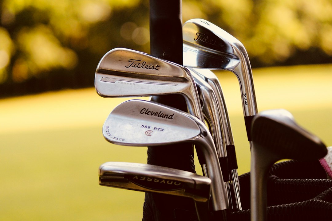 Golf clubs standing together in close up