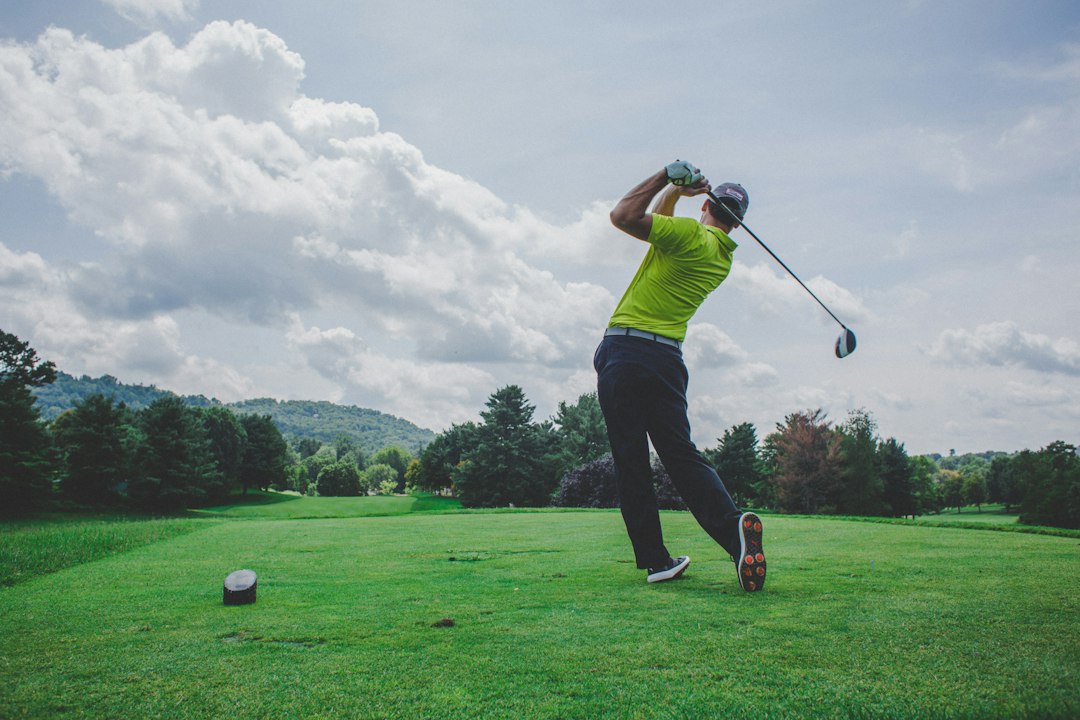 Golf clubs and gear on the course
